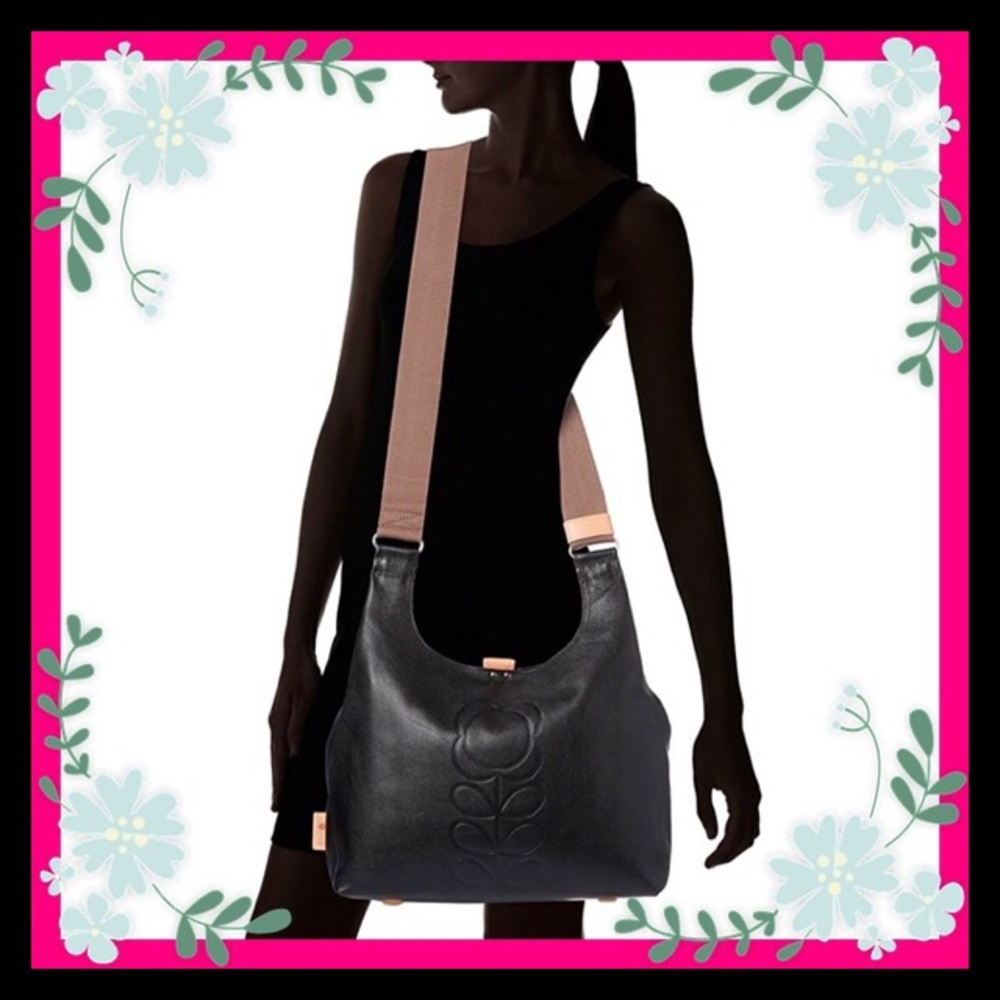 Black Orla Kiely midi sling embossed bag.